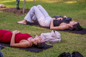 People lying on grass