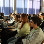 A group of people during the conference