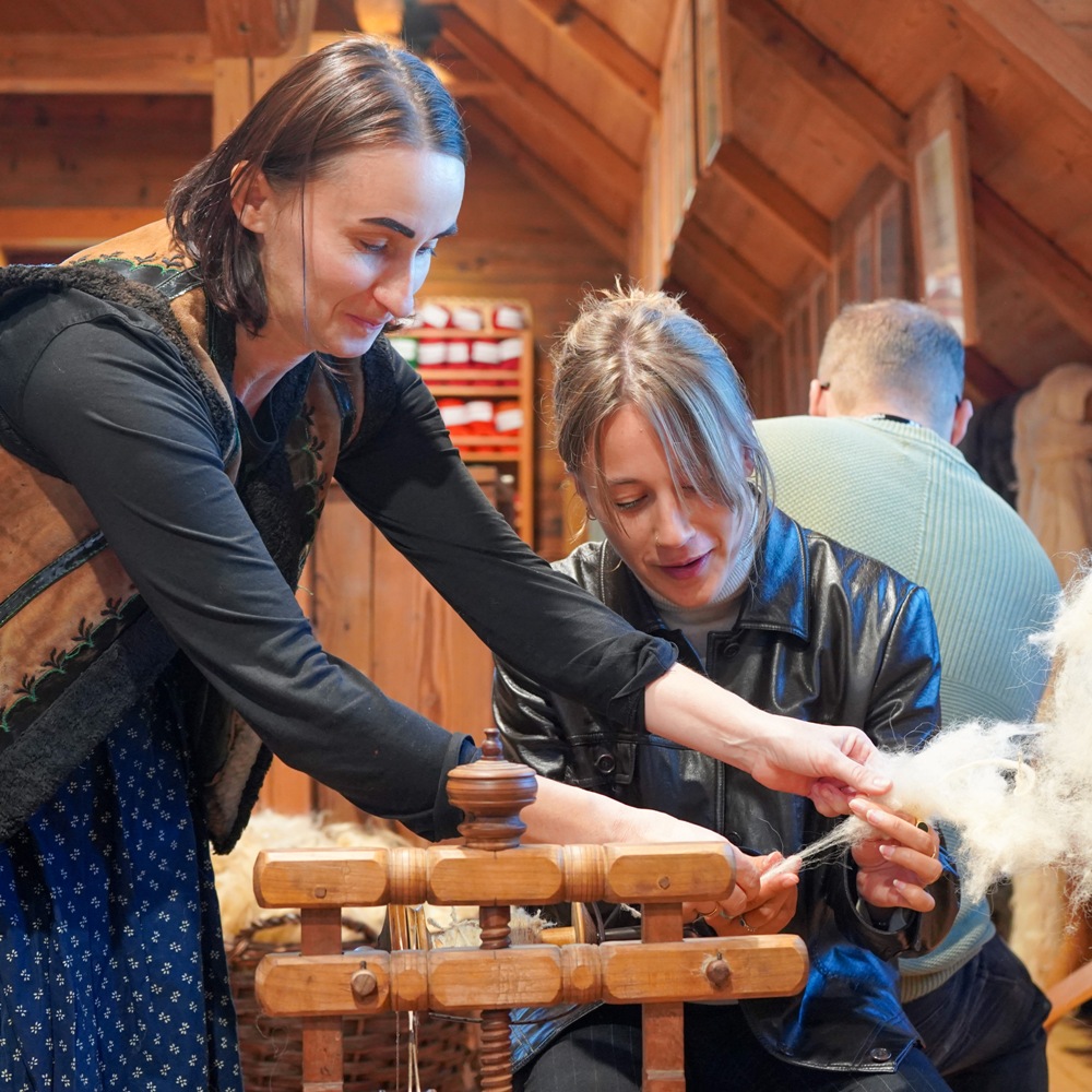 in the workshop, learning to weave