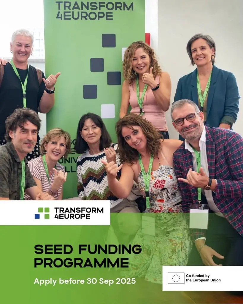 Seven smiling adults, some giving thumbs up, pose in front of a green Transform4Europe banner. Text below reads Seed Funding Programme. Apply before 30 Sep 2025. Co-funded by the European Union.