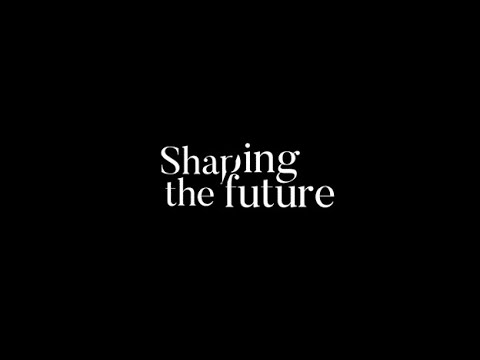 White text on a black background reads, Sharing the future. The font is modern and minimalist, with a stylized letter r in Sharing.