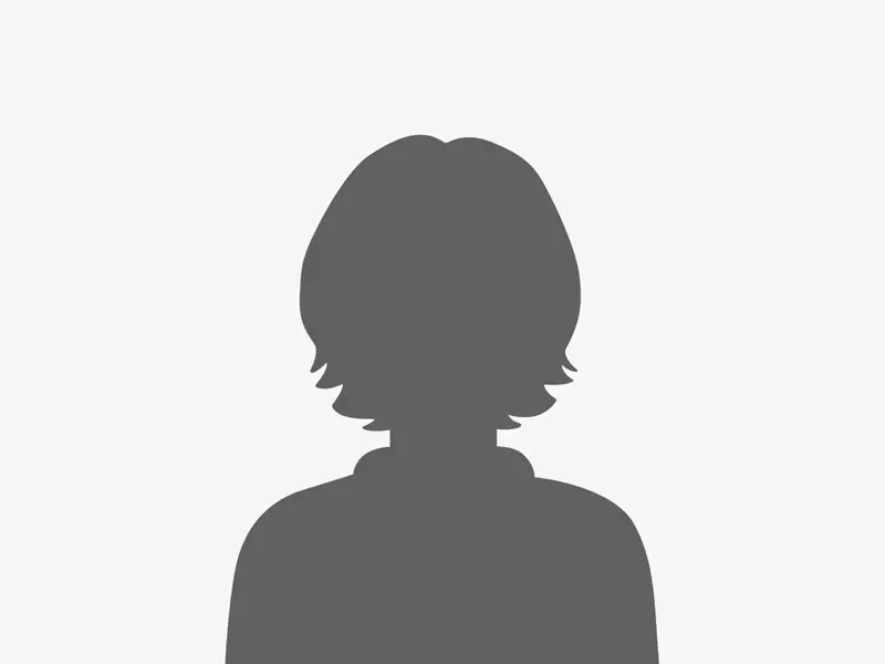 A gray silhouette of a person with shoulder-length hair on a light gray background, facing forward. The image is generic and does not show any facial features or specific details.
